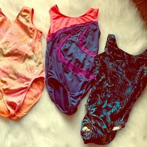 Three girls gymnastics Leo’s